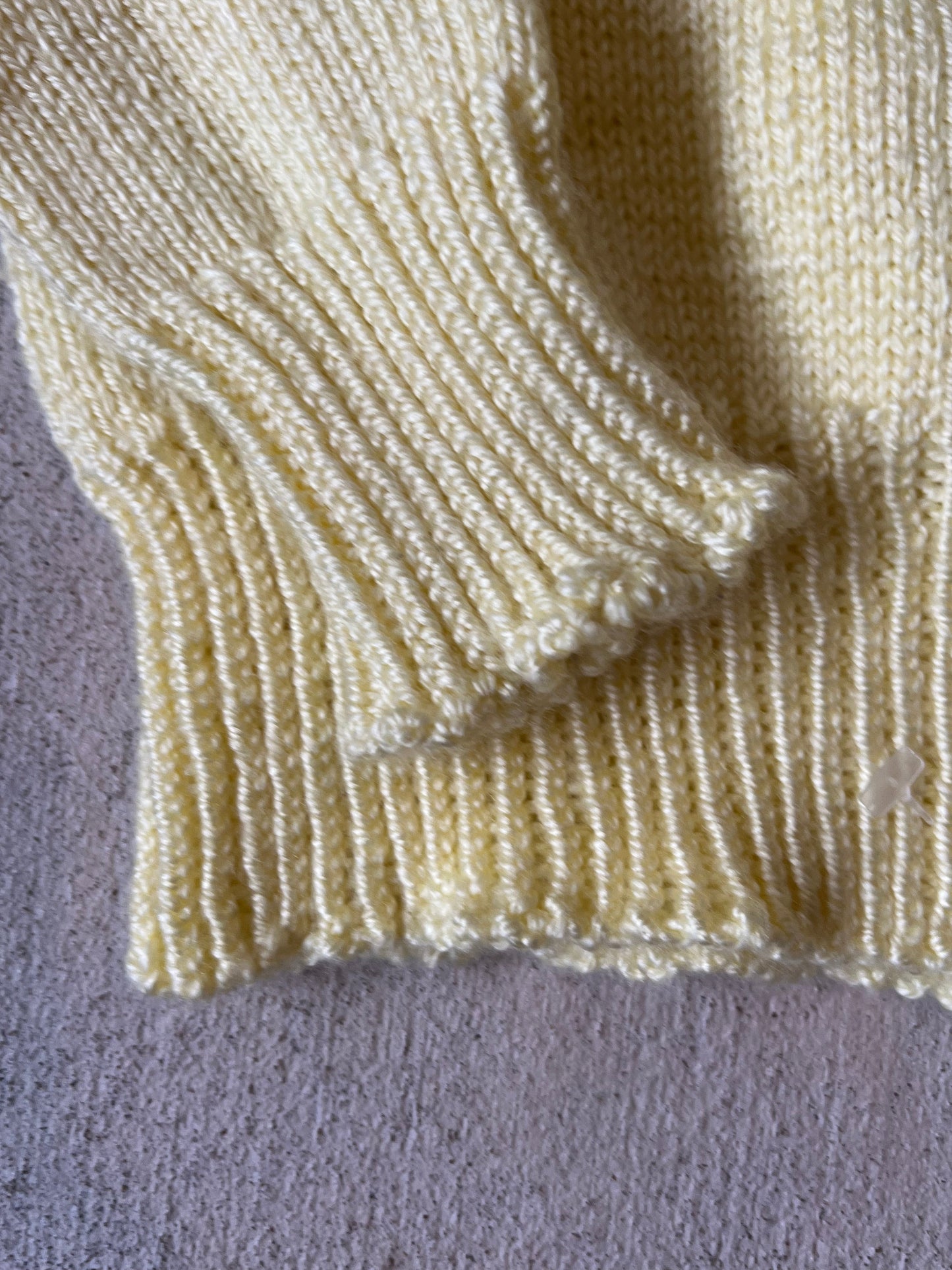 yellow button neck sweater