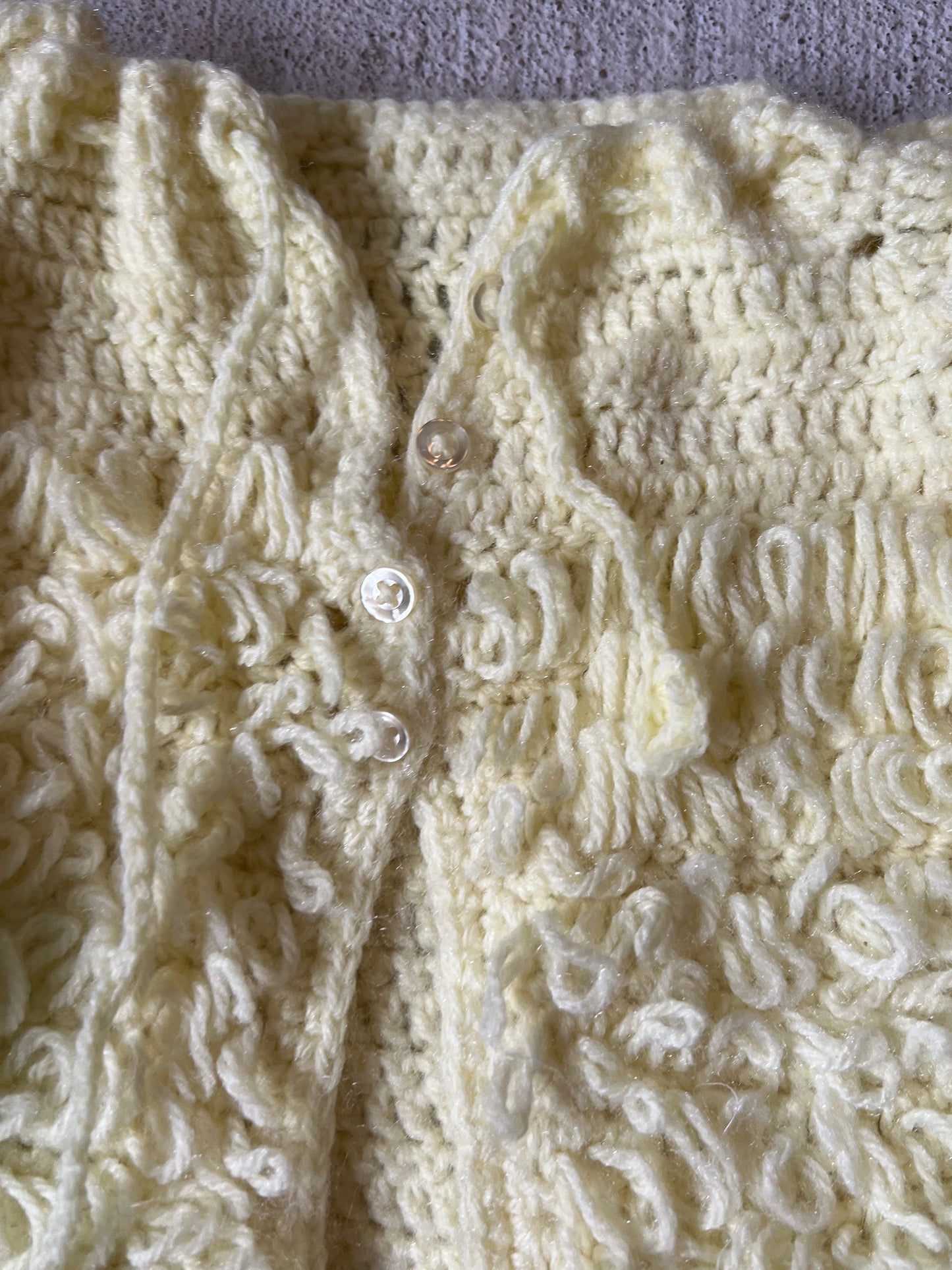 yellow fluffy sweater