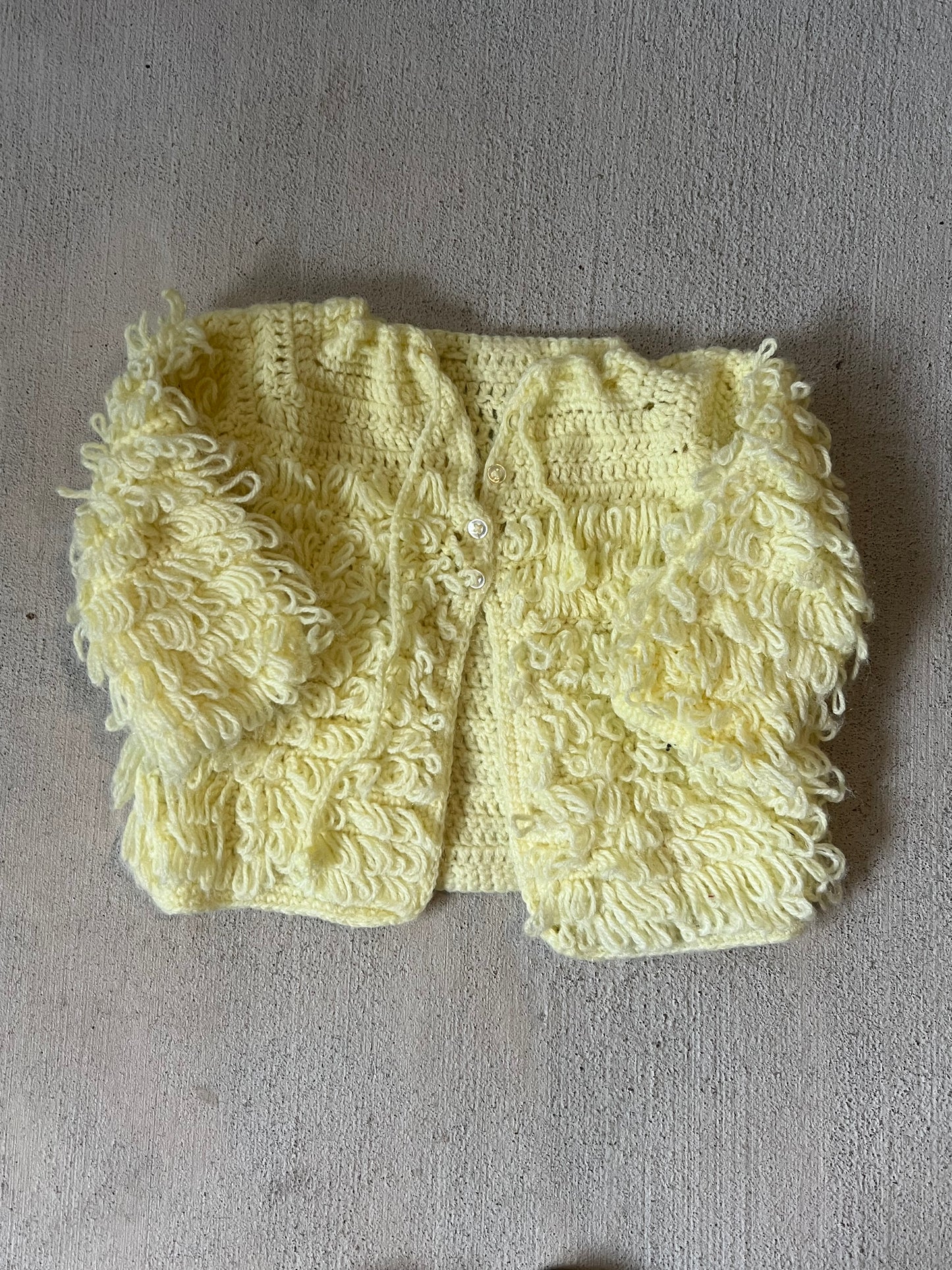 yellow fluffy sweater