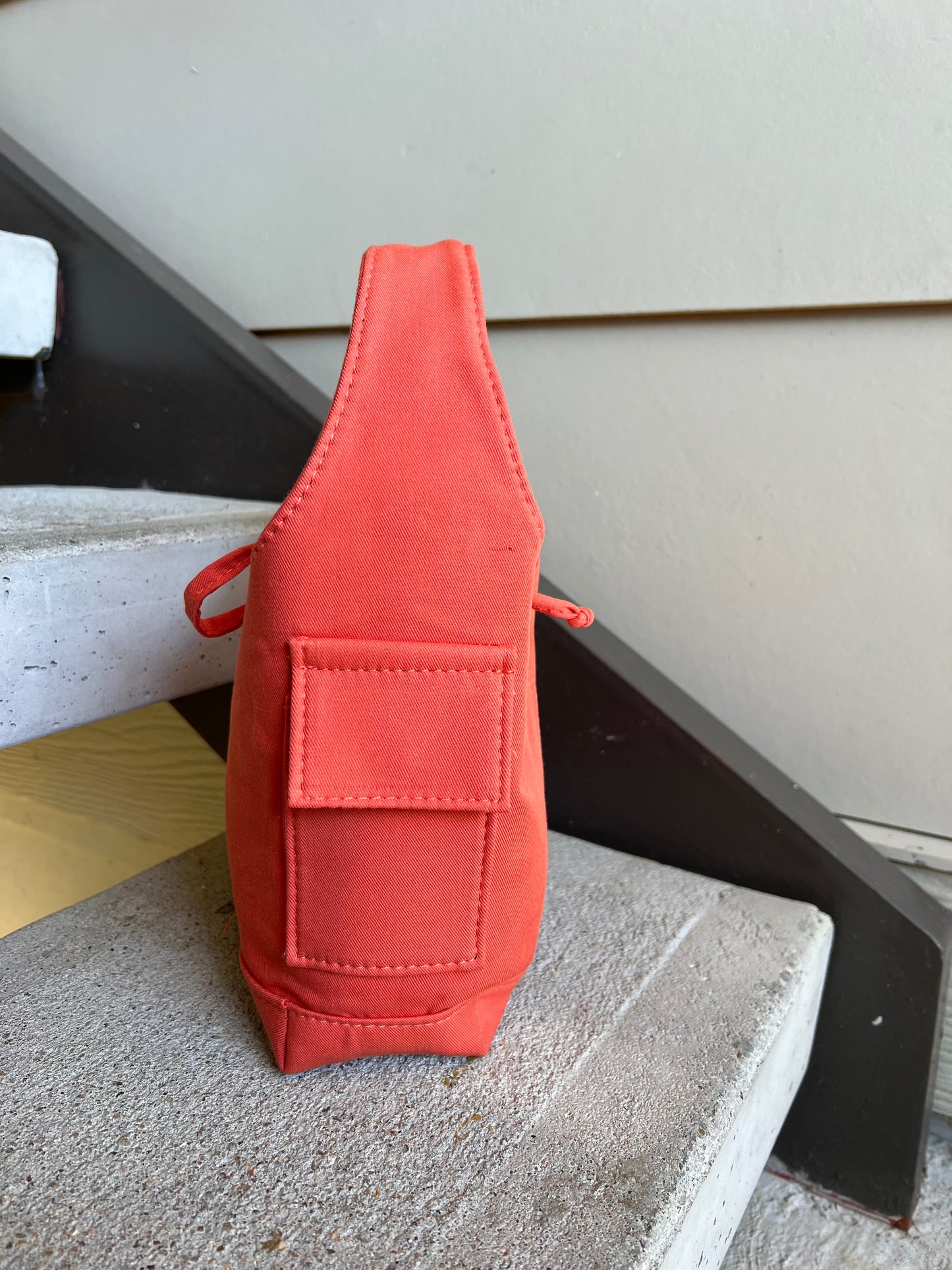 Orange one handle bag