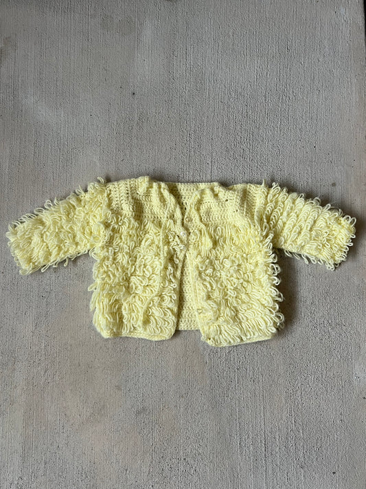 yellow fluffy sweater