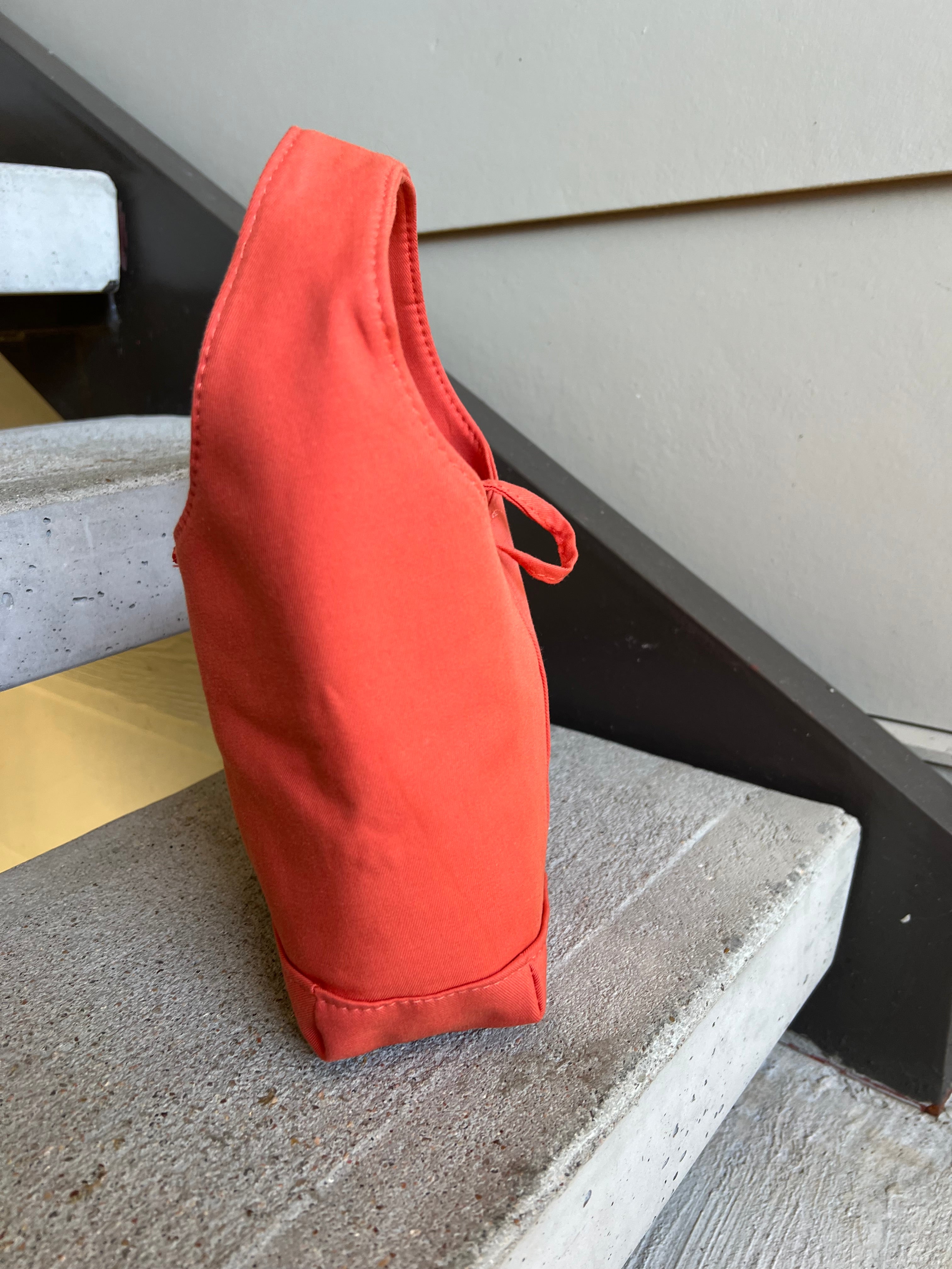 Orange one handle bag