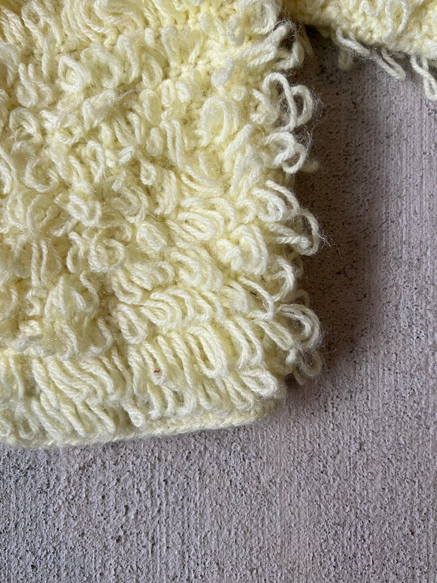 yellow fluffy sweater