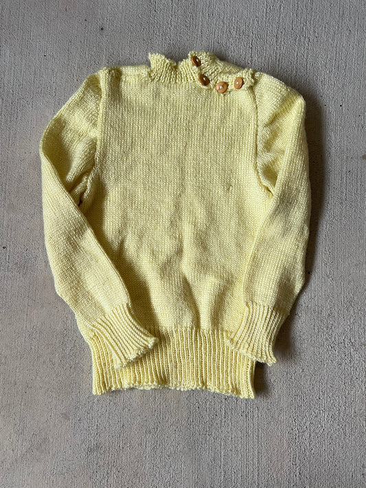 yellow button neck sweater