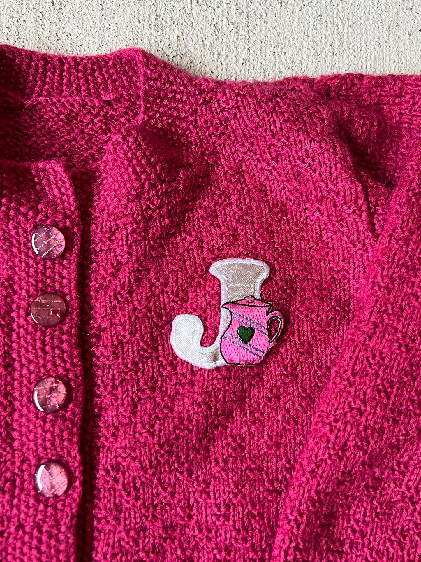 Pink “J” Cardigan